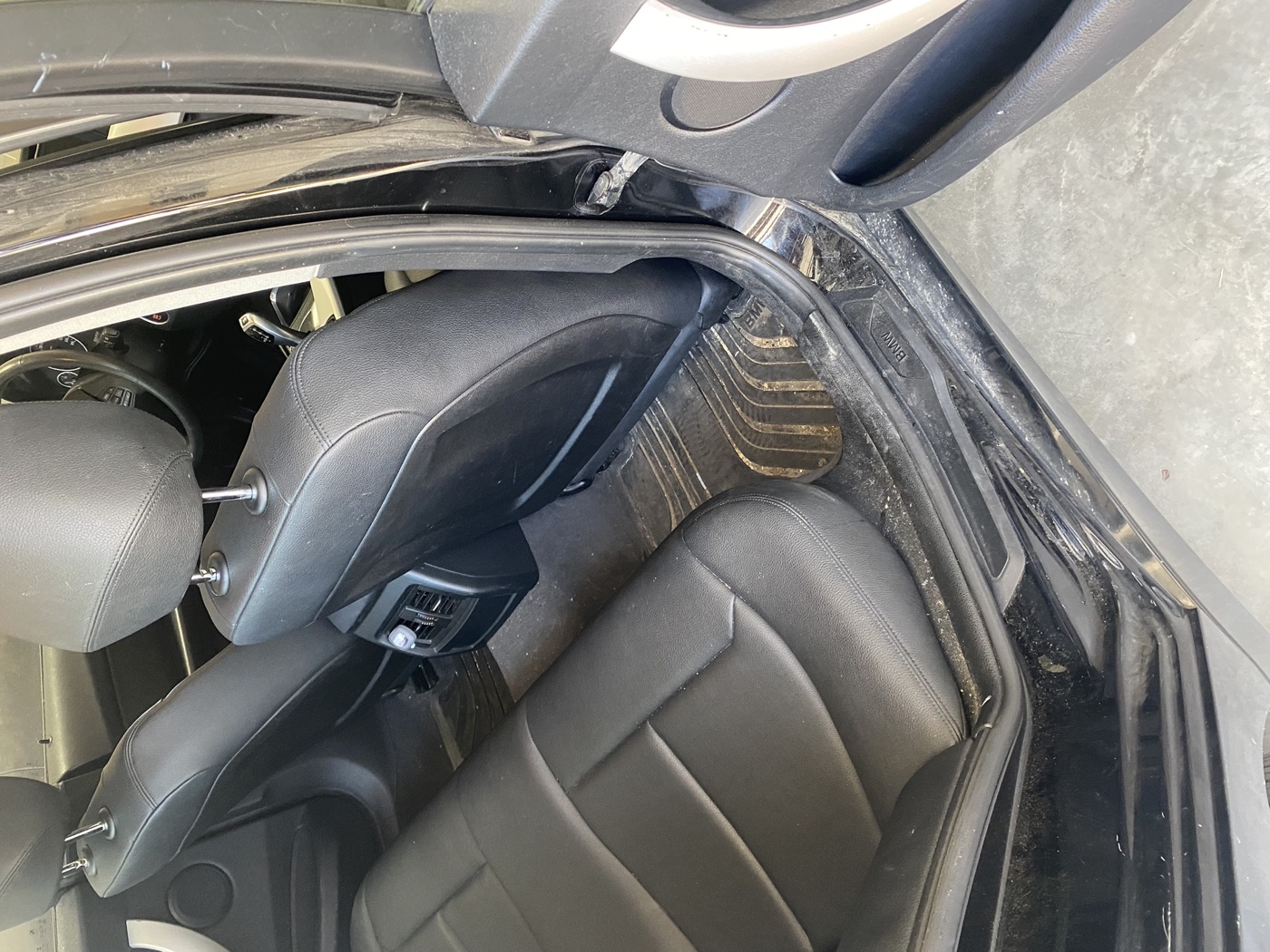 BMW 3 Series interior before detailing — close up