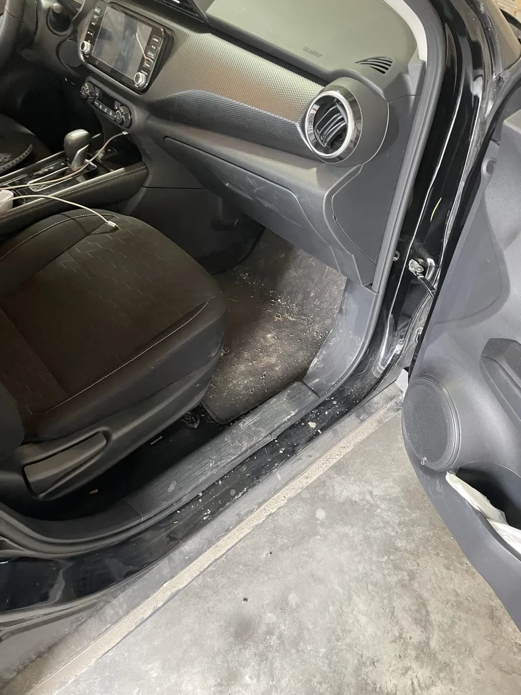 Nissan Kicks interior before detailing — close up