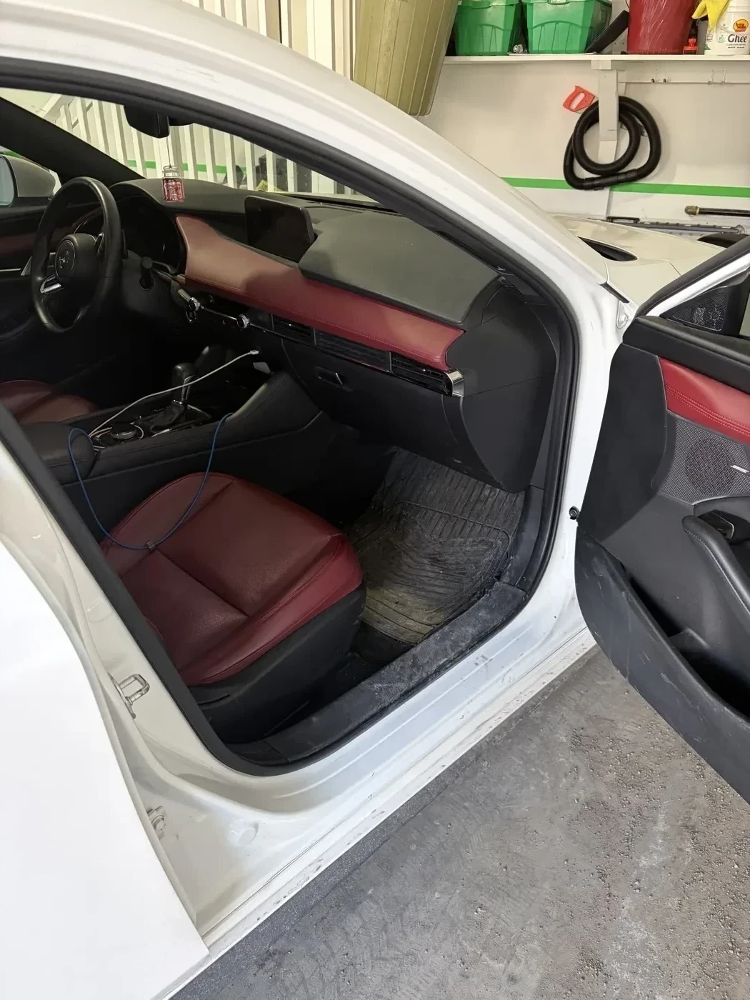 Mazda 3 interior before detailing — close up